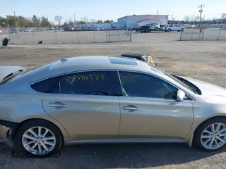 2015 Toyota Avalon Limited with VIN 4T1BK1EB2FU167671, listed as a IAAI auction lot 41710375 with 77,126 mi miles and . Bid and sale history available at DreamBid. Image 13.