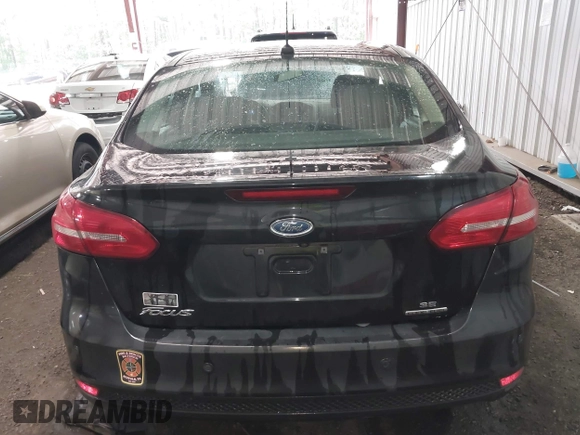 2015 Ford Focus SE with VIN 1FADP3F25FL216205, listed as a IAAI auction lot 42425478 with 124,117 mi miles and . Bid and sale history available at DreamBid. Image 16.