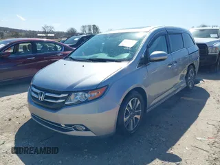 2016 Honda Odyssey Touring Elite with VIN 5FNRL5H96GB090653, listed as a IAAI auction lot 41720195 with 68,969 mi miles. Bid and sale history available at carsss.com. Image 17.