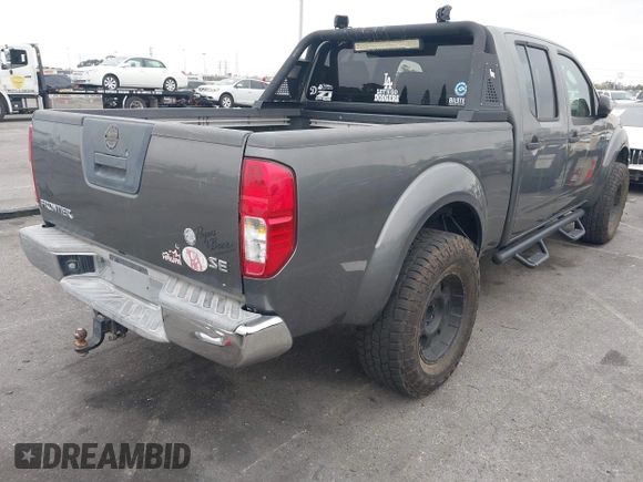2007 Nissan Frontier LE with VIN 1N6AD09U57C439165, listed as a IAAI auction lot 41880759 with 200,291 mi miles and . Bid and sale history available at DreamBid. Image 4.