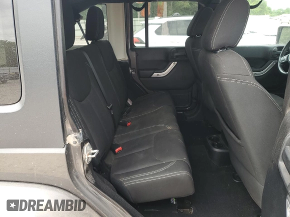 2016 Jeep Wrangler Unlimited Sahara with VIN 1C4BJWEGXGL264740, listed as a Copart auction lot 57225115 with 183,647 mi miles and Salvage title. Bid and sale history available at DreamBid. Image 11.