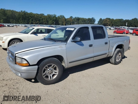 2003 Dodge Dakota SLT with VIN 1D7HL48X33S340079, listed as a Copart auction lot 76516514 with 295,350 mi miles and Clean Title. Bid and sale history available at carsss.com. Image 1.