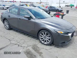 2021 Mazda 3 Preferred with VIN 3MZBPACL4MM214814, listed as a IAAI auction lot 42115140 with 28,860 mi miles and . Bid and sale history available at DreamBid. Image 1.
