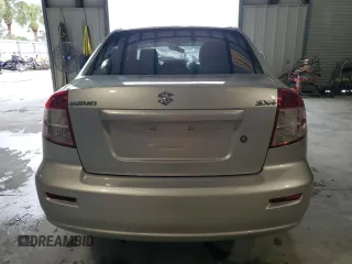 2012 Suzuki SX4 LE with VIN JS2YC5A34C6304150, listed as a Copart auction lot 48629255 with 104,658 mi miles and Salvage Title. Bid and sale history available at carsss.com. Image 6.