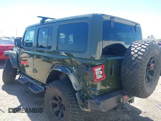 2020 Jeep Wrangler Unlimited Sahara High Altitude with VIN 1C4HJXEG8LW283103, listed as a IAAI auction lot 41830769 with 39,447 mi miles and . Bid and sale history available at DreamBid. Image 3.