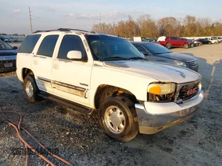 2003 GMC Yukon SLT with VIN 1GKEC13Z43J102238, listed as a IAAI auction lot 41618837 with 371,562 mi miles. Bid and sale history available at carsss.com. Image 1.