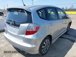 2013 Honda Fit Sport with VIN JHMGE8H51DC005760, listed as a IAAI auction lot 42040427 with 184,375 mi miles. Bid and sale history available at carsss.com. Image 4.