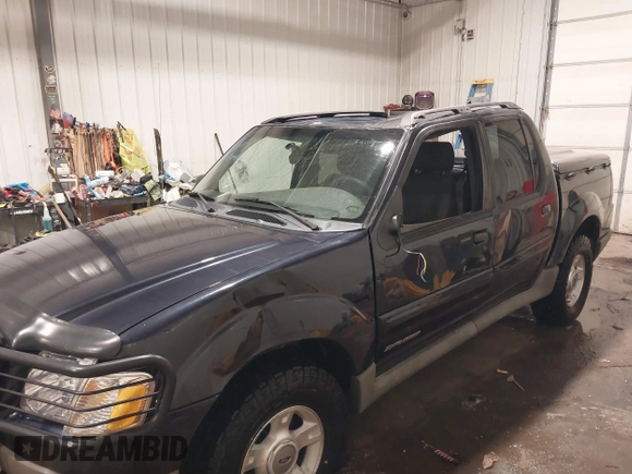 2001 Ford Explorer Sport Trac z VIN 1FMZU77E21UC84338, wystawiony jako IAAI lot #41420422 z przebiegiem 218 094 mil mil oraz . Historia ofert i sprzedaży dostępna na DreamBid. Obrazek 6.
