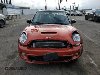 2013 MINI Hardtop S with VIN WMWSV3C57DT477948, listed as a Copart auction lot 54437155 with 63,114 mi miles and Salvage Title. Bid and sale history available at DreamBid. Image 5.