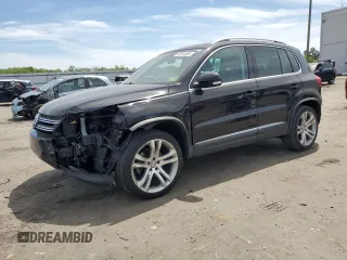 2013 Volkswagen Tiguan SE z VIN WVGAV7AX4DW523112, wystawiony jako Copart lot #53261855 z przebiegiem 86 190 mil mil oraz Szkoda całkowita • Salvage title. Historia ofert i sprzedaży dostępna na DreamBid. Obrazek 1.
