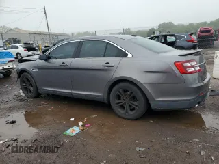 2013 Ford Taurus SEL z VIN 1FAHP2E87DG104349, wystawiony jako Copart lot #57143135 z przebiegiem 129 927 mil mil oraz Szkoda całkowita • Salvage title. Historia ofert i sprzedaży dostępna na DreamBid. Obrazek 2.