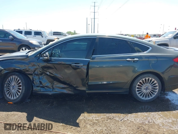 2016 Ford Fusion Titanium with VIN 3FA6P0K98GR158877, listed as a IAAI auction lot 41994013 with 57,027 mi miles and . Bid and sale history available at DreamBid. Image 15.