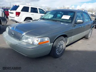 2004 Mercury Grand Marquis GS with VIN 2MEFM74W74X678515, listed as a IAAI auction lot 41916962 with 121,789 mi miles. Bid and sale history available at carsss.com. Image 2.