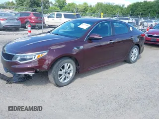 2017 Kia Optima LX with VIN 5XXGT4L33HG156157, listed as a IAAI auction lot 42712608 with 177,079 mi miles and . Bid and sale history available at DreamBid. Image 2.