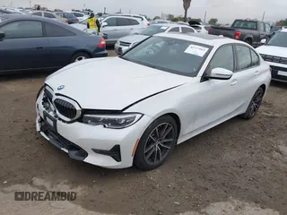 2022 BMW 3 Series 330i with VIN 3MW5R1J0XN8C67673, listed as a IAAI auction lot 41777963 with 21,812 mi miles and . Bid and sale history available at DreamBid. Image 2.