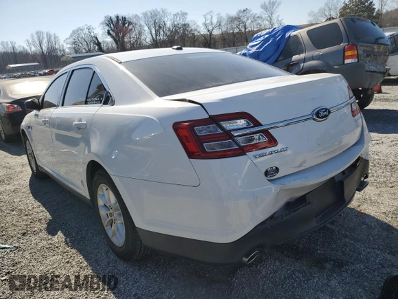 2014 Ford Taurus SE with VIN 1FAHP2D8XEG112805, listed as a Copart auction lot 48975265 with 127,730 mi miles and Salvage Title. Bid and sale history available at DreamBid. Image 2.