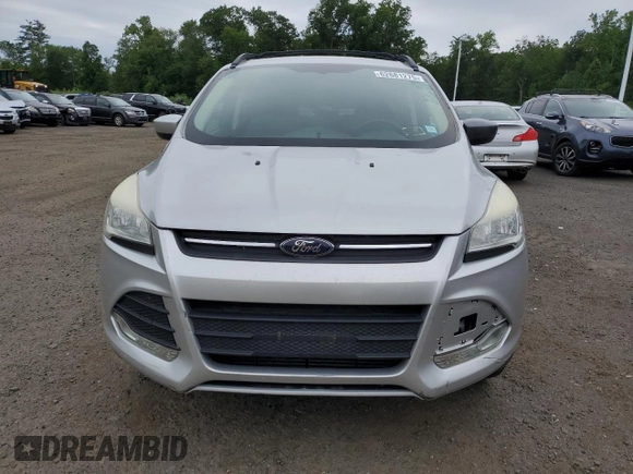 2013 Ford Escape SE z VIN 1FMCU9G9XDUC40645, wystawiony jako Copart lot #62681275 z przebiegiem 117 744 mil mil oraz Czysty tytuł • Clean title. Historia ofert i sprzedaży dostępna na DreamBid. Obrazek 5.