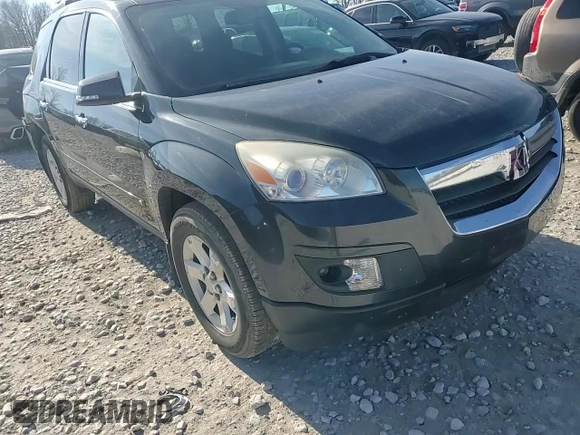 2007 Saturn Outlook XR z VIN 5GZER237X7J122383, wystawiony jako Copart lot #79831624 z przebiegiem 143 410 mil mil oraz Czysty tytuł • Clean title. Historia ofert i sprzedaży dostępna na DreamBid. Obrazek 11.