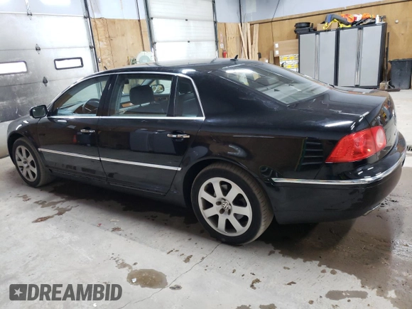 2004 Volkswagen Phaeton V8 z VIN WVWAF63D048011110, wystawiony jako Copart lot #66467834 z przebiegiem 138 229 mil mil oraz Tytuł czysty. Historia ofert i sprzedaży dostępna na DreamBid. Obrazek 2.