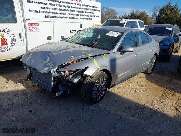 2023 Hyundai Sonata Hybrid SEL with VIN KMHL34JJ7PA081257, listed as a IAAI auction lot 41160978 with 12,057 mi miles. Bid and sale history available at carsss.com. Image 2.