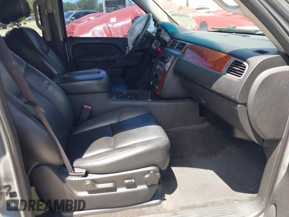 2012 Chevrolet Suburban LT with VIN 1GNSCJE04CR230288, listed as a IAAI auction lot 42049580 with 166,596 mi miles. Bid and sale history available at carsss.com. Image 5.