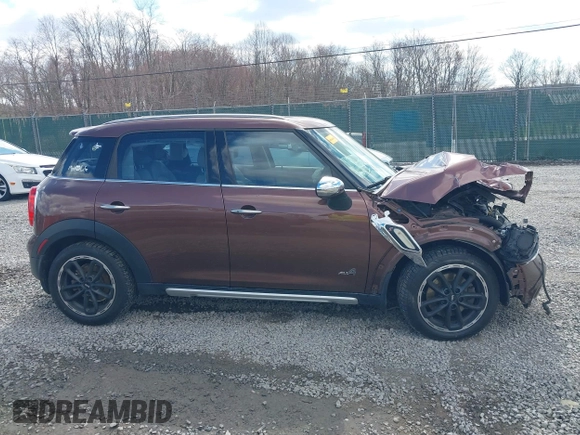 2016 MINI Countryman S z VIN WMWZC5C55GWU01180, wystawiony jako IAAI lot #41874470 z przebiegiem 194 997 mil mil oraz . Historia ofert i sprzedaży dostępna na DreamBid. Obrazek 13.