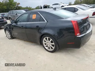 2009 Cadillac CTS AWD w/1SA with VIN 1G6DH577590123416, listed as a Copart auction lot 48297495 with 142,728 mi miles and Salvage Title. Bid and sale history available at carsss.com. Image 2.