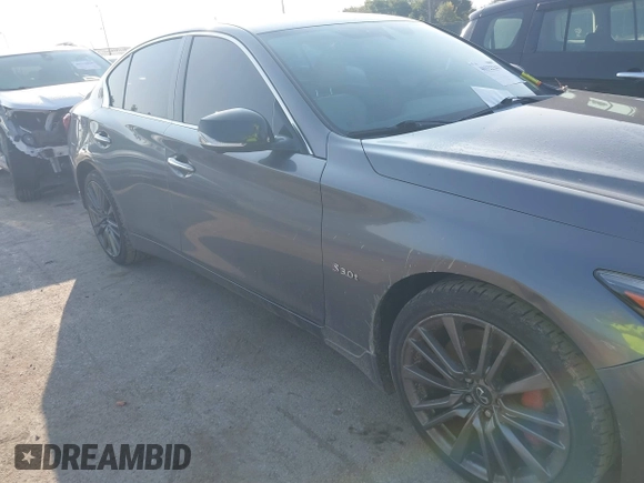 2020 Infiniti Q50 Red Sport 400 with VIN JN1FV7AR8LM660823, listed as a IAAI auction lot 40322341 with 104,530 mi miles and . Bid and sale history available at carsss.com. Image 13.