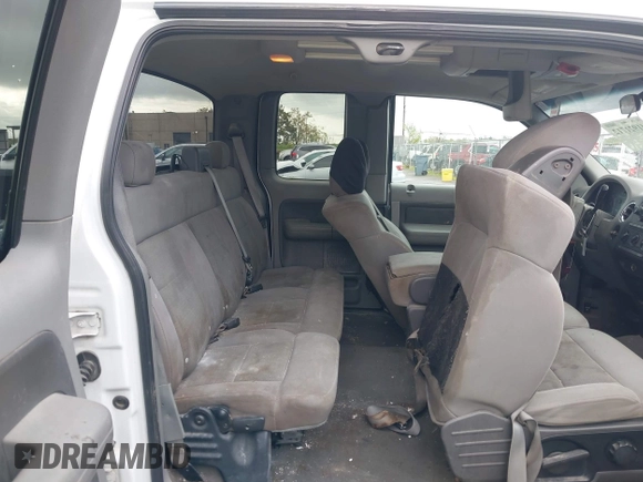 2004 Ford F-150 STX with VIN 1FTRX12W84NC29545, listed as a IAAI auction lot 41921712 with 304,891 mi miles. Bid and sale history available at carsss.com. Image 8.