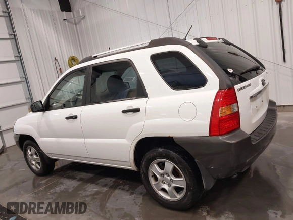2007 Kia Sportage LX with VIN KNDJF724877399530, listed as a IAAI auction lot 41696698 with 124,967 mi miles. Bid and sale history available at carsss.com. Image 14.