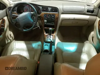 2001 Subaru Legacy Outback Limited with VIN 4S3BE686717200534, listed as a Copart auction lot 86165654 with 151,481 mi miles and Salvage title. Bid and sale history available at DreamBid. Image 8.