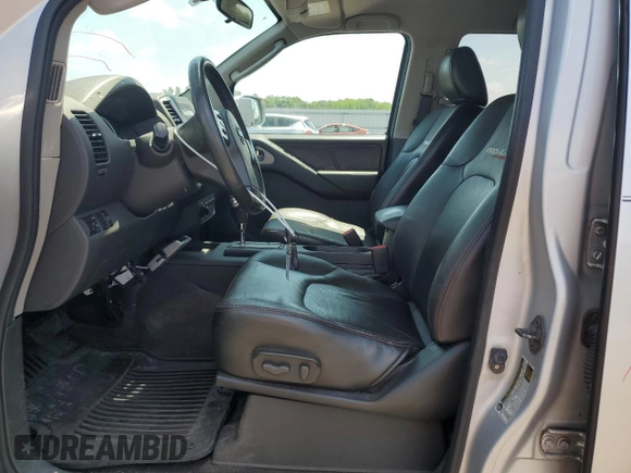 2010 Nissan Frontier Pro-4X with VIN 1N6AD0EV5AC435641, listed as a Copart auction lot 63388025 with 84,349 mi miles and Salvage title. Bid and sale history available at DreamBid. Image 7.