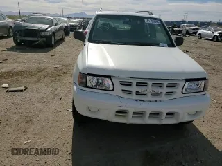 2000 Isuzu Rodeo S z VIN 4S2CK58W2Y4317915, wystawiony jako Copart lot #81780094 z przebiegiem 158 217 mil mil oraz Szkoda całkowita • Salvage title. Historia ofert i sprzedaży dostępna na DreamBid. Obrazek 11.