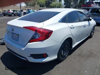 2020 Honda Civic LX with VIN 2HGFC2F67LH511473, listed as a IAAI auction lot 42614633 with 91,822 mi miles and . Bid and sale history available at DreamBid. Image 4.