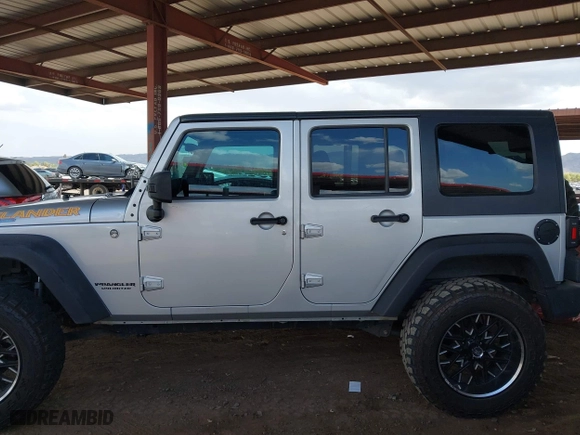 2010 Jeep Wrangler Unlimited Sport with VIN 1J4BA3H18AL161243, listed as a IAAI auction lot 41960370 with 89,004 mi miles. Bid and sale history available at carsss.com. Image 14.