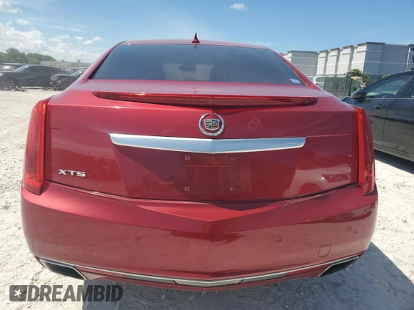 2013 Cadillac XTS Luxury z VIN 2G61P5S38D9159500, wystawiony jako Copart lot #62060415 z przebiegiem 112 347 mil mil oraz Czysty tytuł • Clean title. Historia ofert i sprzedaży dostępna na DreamBid. Obrazek 6.