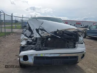 2012 Toyota Tundra with VIN 5TFUW5F16CX225421, listed as a IAAI auction lot 42210783 with 207,025 mi miles and . Bid and sale history available at DreamBid. Image 6.