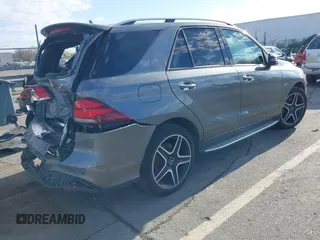 2018 Mercedes-Benz GLE 43 AMG with VIN 4JGDA6EB3JB100851, listed as a IAAI auction lot 41791759 with 70,155 mi miles and . Bid and sale history available at DreamBid. Image 4.