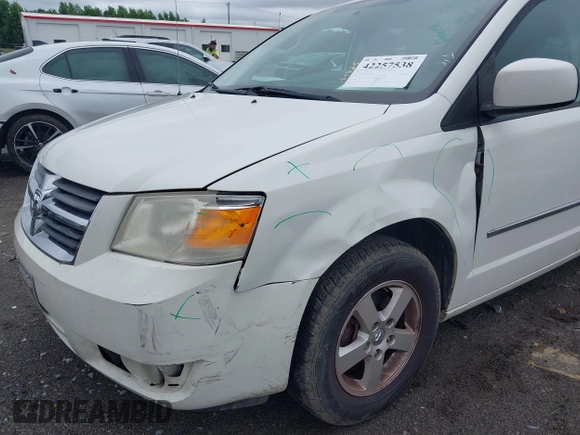 2010 Dodge Grand Caravan SXT z VIN 2D4RN5D18AR247124, wystawiony jako IAAI lot #42257538 z przebiegiem 197 443 mil mil oraz . Historia ofert i sprzedaży dostępna na DreamBid. Obrazek 6.