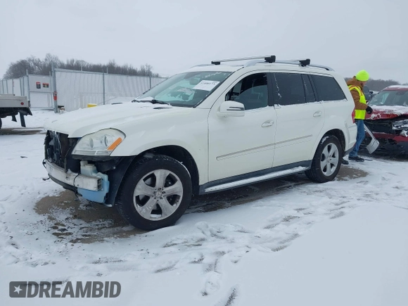 2012 Mercedes-Benz GL-Class GL 450 with VIN 4JGBF7BE1CA778228, listed as a IAAI auction lot 41600173 with 115,605 mi miles. Bid and sale history available at carsss.com. Image 2.