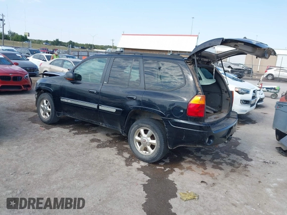 2002 GMC Envoy SLT with VIN 1GKDS13S522214475, listed as a IAAI auction lot 40580711 with 1 mi miles. Bid and sale history available at carsss.com. Image 3.