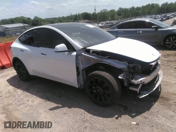 2022 Tesla Model Y Long Range z VIN 7SAYGDEE3NF385933, wystawiony jako IAAI lot #42059675 z przebiegiem 88 488 mil mil oraz . Historia ofert i sprzedaży dostępna na DreamBid. Obrazek 1.