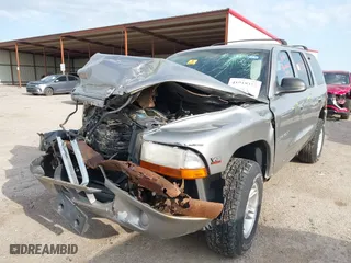 1999 Dodge Durango with VIN 1B4HS28Y9XF672873, listed as a IAAI auction lot 41919377 with 1 mi miles. Bid and sale history available at carsss.com. Image 2.