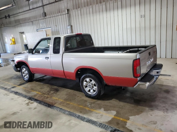 2000 Nissan Frontier XE with VIN 1N6DD26S8YC337811, listed as a Copart auction lot 54775915 with 129,427 mi miles and Salvage title. Bid and sale history available at DreamBid. Image 2.