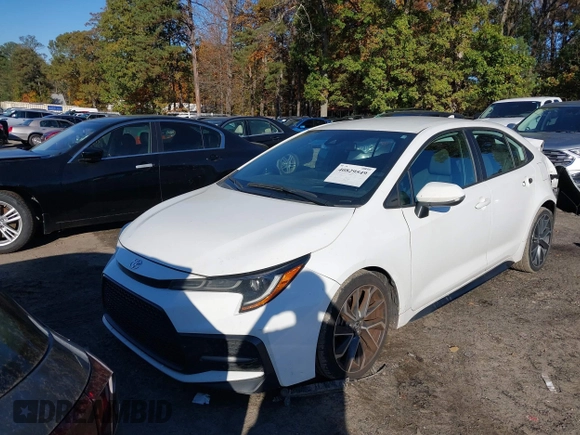 2021 Toyota Corolla SE with VIN 5YFS4MCE7MP061482, listed as a IAAI auction lot 40829549 with 137,629 mi miles. Bid and sale history available at carsss.com. Image 18.