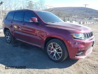 2017 Jeep Grand Cherokee SRT with VIN 1C4RJFDJ1HC754559, listed as a IAAI auction lot 41461029 with 100,096 mi miles. Bid and sale history available at carsss.com. Image 1.