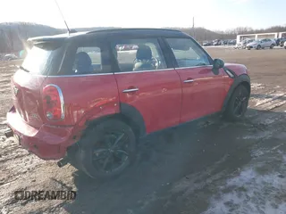 2013 MINI Countryman S z VIN WMWZC3C58DWP22372, wystawiony jako IAAI lot #41523123 z przebiegiem 50 410 mil mil oraz . Historia ofert i sprzedaży dostępna na DreamBid. Obrazek 4.