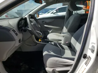 2009 Toyota Corolla with VIN JTDBL40E699047335, listed as a Copart auction lot 54758925 with 212,801 mi miles and Salvage Title. Bid and sale history available at carsss.com. Image 7.