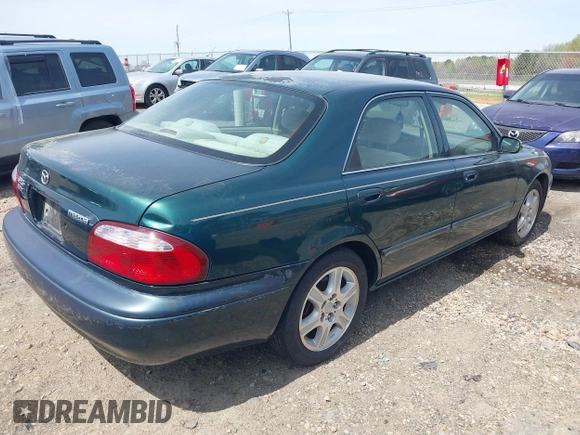 2001 Mazda 626 LX z VIN 1YVGF22D915241384, wystawiony jako IAAI lot #41927705 z przebiegiem 231 801 mil mil oraz . Historia ofert i sprzedaży dostępna na DreamBid. Obrazek 4.