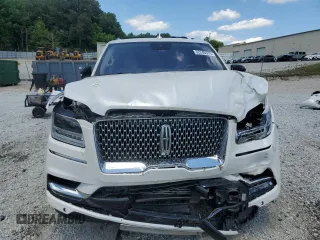 2019 Lincoln Navigator Reserve z VIN 5LMJJ2LT9KEL19544, wystawiony jako Copart lot #52240315 z przebiegiem 74 144 mil mil oraz Szkody całkowita. Historia ofert i sprzedaży dostępna na DreamBid. Obrazek 5.